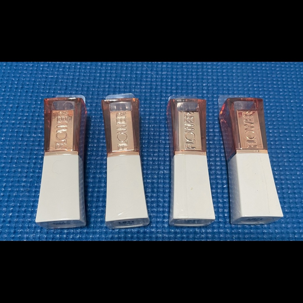 4 new flowers lipstick by (Drew Barrymore)